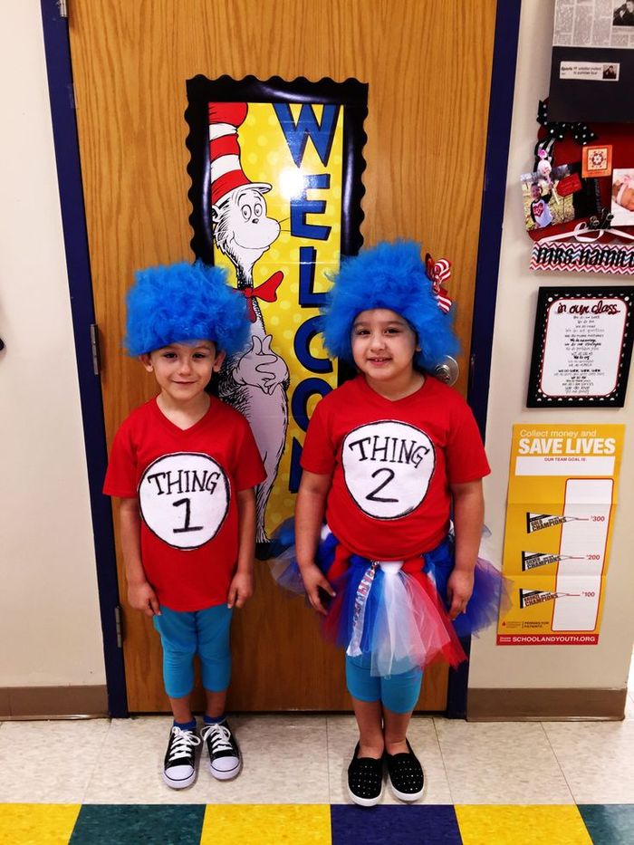 Students dressed as Thing 1 and Thing 2 at a school Dr. Seuss Day parade